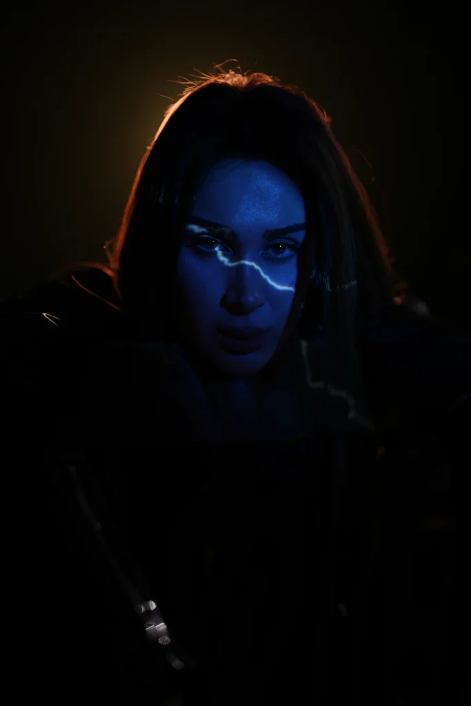 Portrait lit with blue light, AI photo booth style